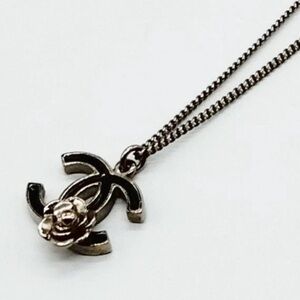 CHANEL Black and Silver Camellia Necklace